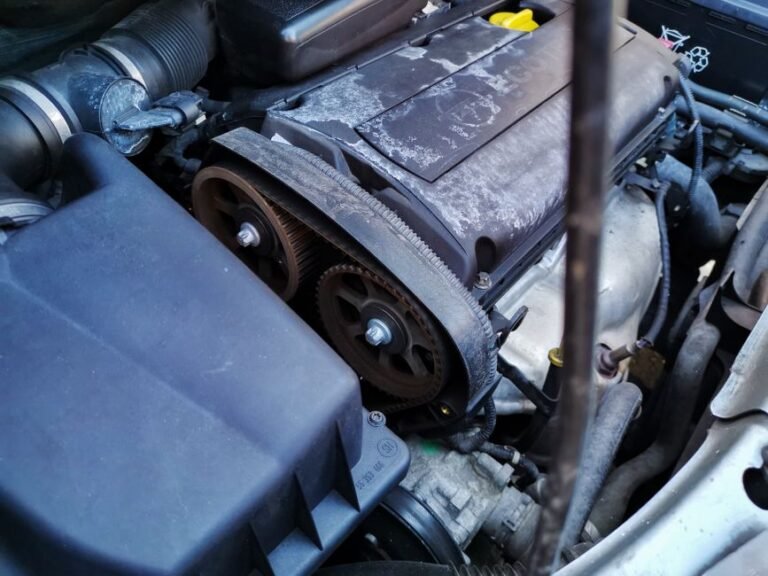 A close-up of a car engine's timing belt