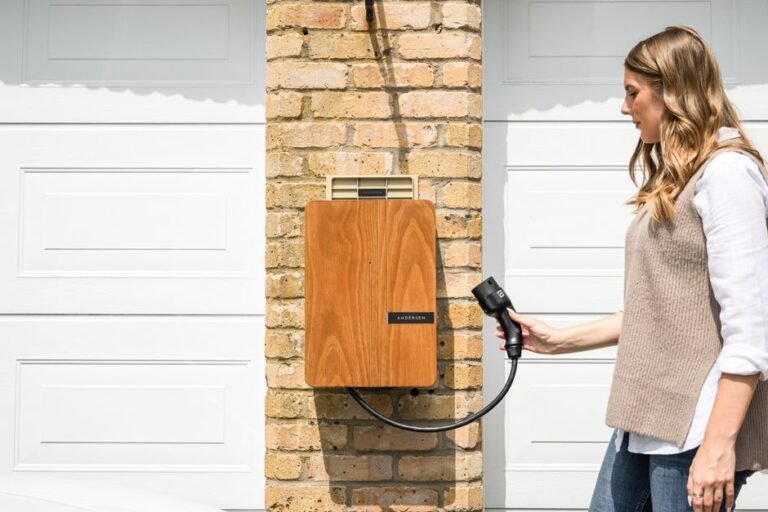 A home EV charger mounted on a garage wall