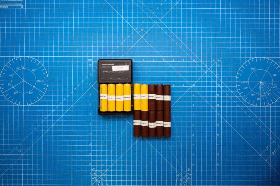 A set of rechargeable batteries in a storage case