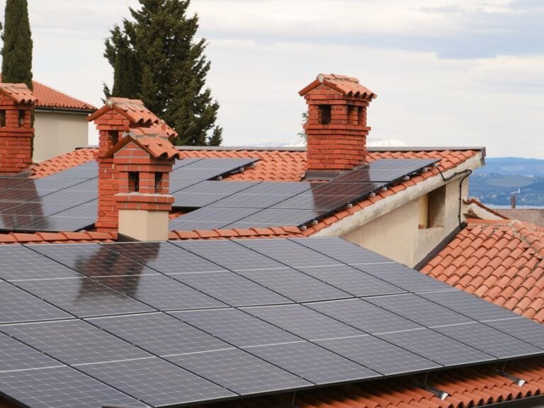 Solar panels installed across the roof of a suburban house